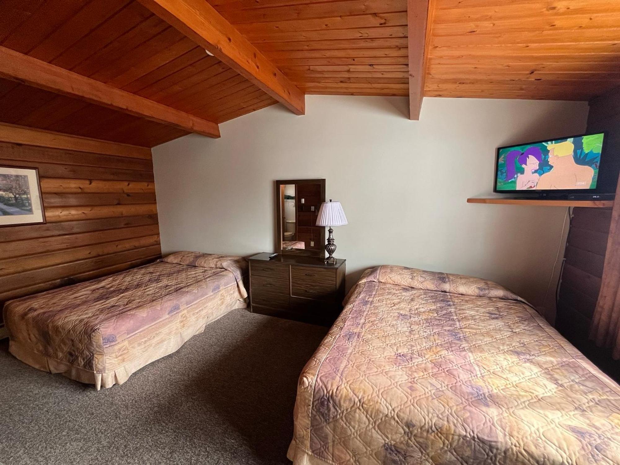 Raccoon Lodge Motel Sylvan Lake Extérieur photo